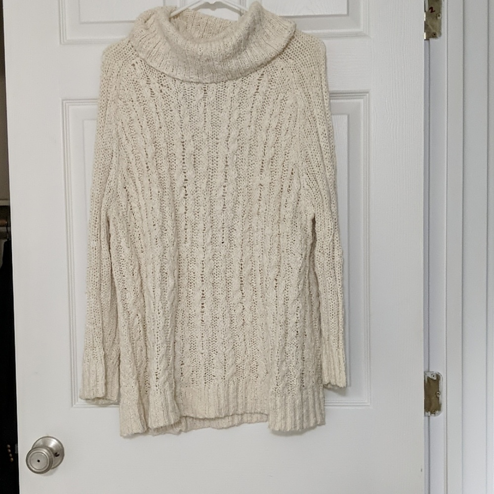 Free People cream knit sweater with open back